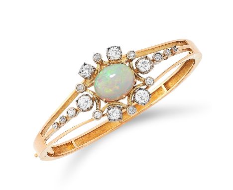 ANTIQUE OPAL AND DIAMOND BANGLE set with a cabochon opal in a border of old cut diamonds, 6cm inner diameter, 31.3g.