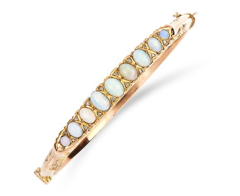 ANTIQUE VICTORIAN OPAL AND DIAMOND BANGLE set with cabochon opals and diamond sparks, 6cm inner diameter, 10.3g.