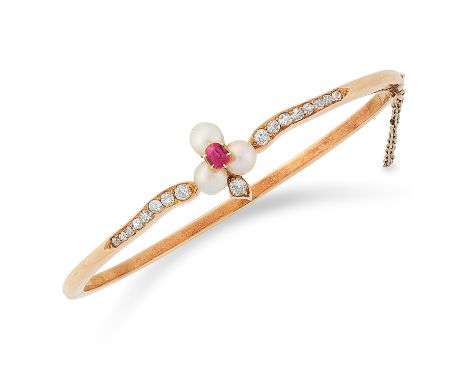 RUBY, DIAMOND AND PEARL BANGLE set with pearls, cushion cut ruby and round cut diamonds, 6cm inner diameter, 10g.