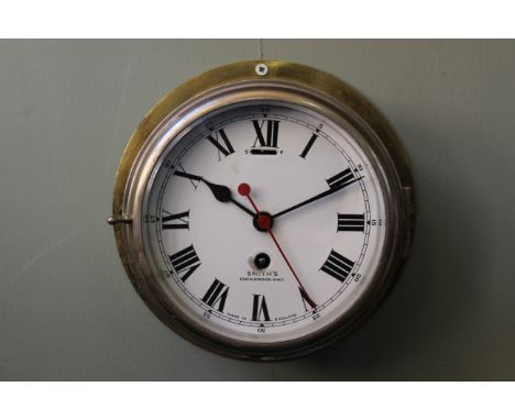 A mid 20th Century Air Ministry, brass and chrome bulkhead timepiece, Smiths Cricklewood NW2, the drum shaped case with hinge