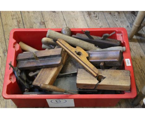 A box of vintage wood working tools