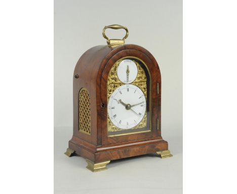 An early 19th Century mahogany cased, quarter repeating 8 day bracket clock, Marriott, London, the arched case with a replace