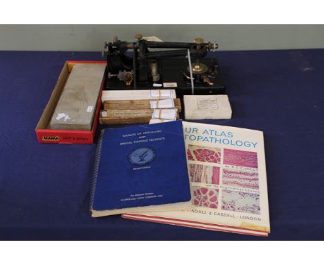 A mixed lot comprising of a 'First Series' rocking microtome, Cambridge Instrument Co, two boxed Heiffor microtome knives and