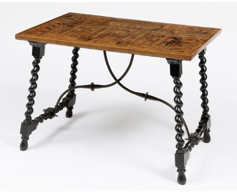 German table, 17th century.Cabinet front adapted to table top.Ebonised legs.Iron fasteners.Restorations (20th century).Break 