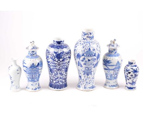 A group of Chinese blue &amp; white porcelain vases, 18th &amp; 19th century, comprising an 18th century miniature vase, pain