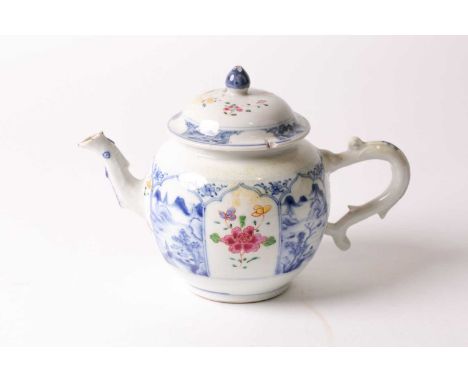 A Chinese porcelain blue &amp; white teapot, 18th century, the pointed arched panels finely painted with buildings beside pin