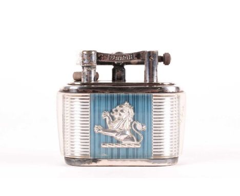 A Lucas Dunhill silver plated table lighter, having dual rampant lions upon a blue and silvered ribbed ground enclosed within