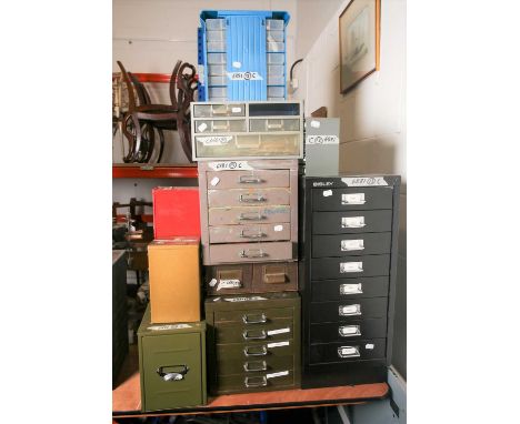 A large quantity of mostly watchmakers spares parts and precision tools in including balance staffs, springs, lenses, springs