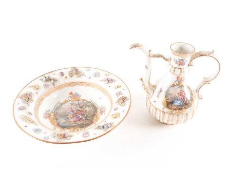 A Meissen porcelain Eastern style ewer and basin, 19th century. Painted with 18th-century figures in romantic landscapes. The