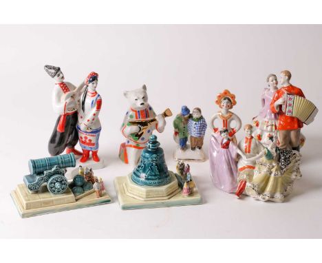 A Konakovo Zik Soviet Russian porcelain model of the Tsar canon and Tsar bell. Together with a Dulevo bear with balalaika, a 