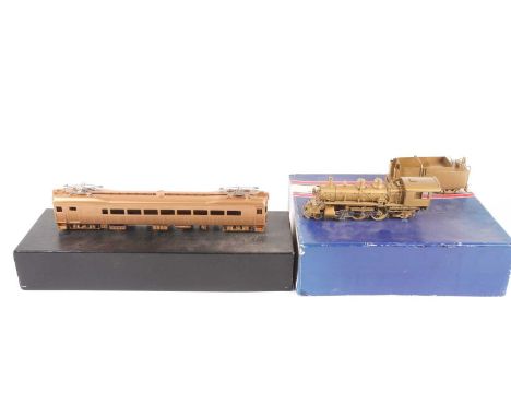An NJ International Inc. brass railway model, Great Northern Class K 4-4-2, in orginal box and with a purchase receipt, toget