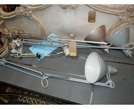 A set of three vintage anglepoise clamp work lights, designed by Jacob Jacobsen, Oslo, stamped US patent 2787434, together wi