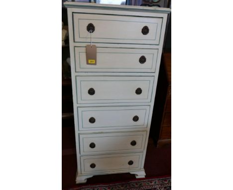 A 20th century cream painted pedestal chest, with six drawers raised on bracket feet, H.137 W.62 D.40cm 
