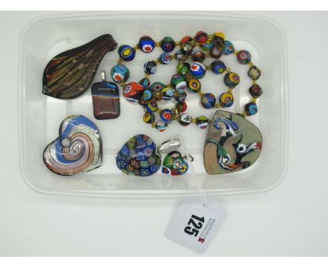 Meab; An Irish Enamel Brooch, a millefiore style glass heart pendant, stamped "925", a glass bead necklace, glass pendants et