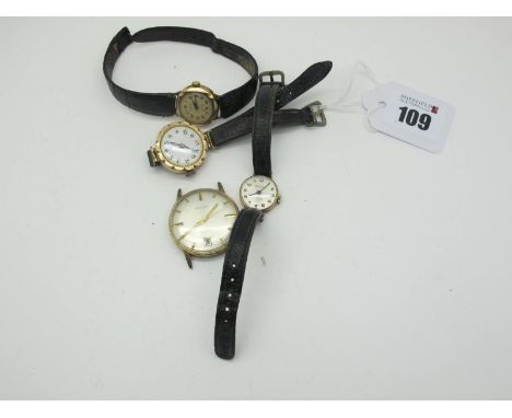 A Vintage 9ct Gold Cased Ladies Wristwatch, with black and red Arabic numerals, further ladies wristwatches and a gent's wris