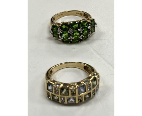 A 9 carat gold and sapphire set dress ring size K, 3.7 g together with a 9 carat gold chrome diopside set dress ring