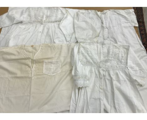 A box containing cotton nightdresses, christening gowns, various tablecloths and napkins etc together with two early 20th Cen