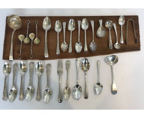 A collection of small silver flat ware various including spoons, small sauce ladle, shell bowled sauce ladle, Christening for