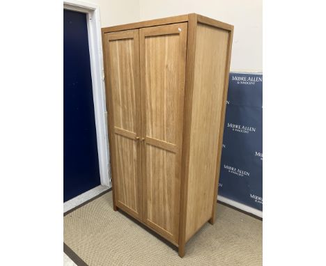 A modern light oak Laura Ashley two door wardrobe in the Arts & Crafts style 100 cm wide x 60 cm deep x 196 cm high