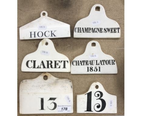 Six various 19th Century white glazed pottery wine bin tags including a Wedgwood example impressed "Wedgwood ORV for 1867" in