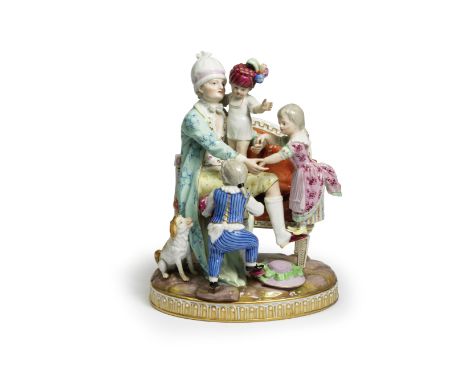 A Meissen group of 'The Good Father', late 19th centuryAfter the model by J.C. Schönheit of 1785, the father wearing a turquo
