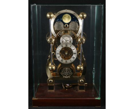 Sinclair Harding lacquered brass Harrison Sea clock, with moon-phase, on mahogany plinth with glass dome. CONDITION REPORT: M