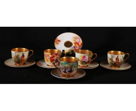 Two Royal Worcester coffee cups and saucers, painted with pheasants by A Shuck and Price, 5.5cm, a cup and saucer with fruit 