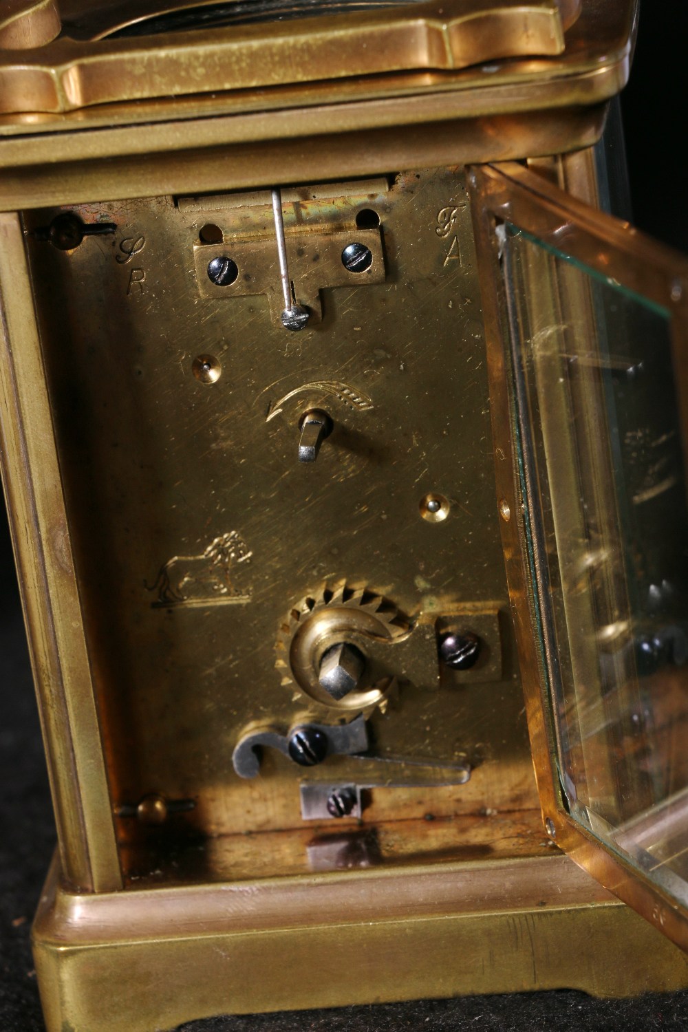 French brass carriage clock, with leather case, lion stamp to movement