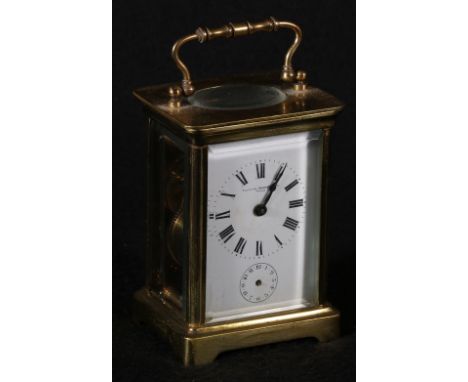 French brass carriage clock, the Roman dial with seconds and labelled for Sir John Bennett Ltd, Paris, with bell on underside