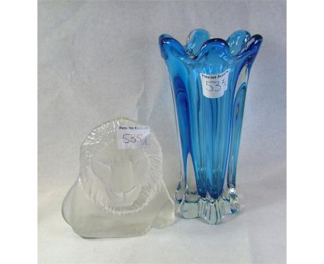 A vintage Whitefriars style fluted blue glass vase and a Royal Krona of Sweden Lion figure, designed by Mats Jonasson.