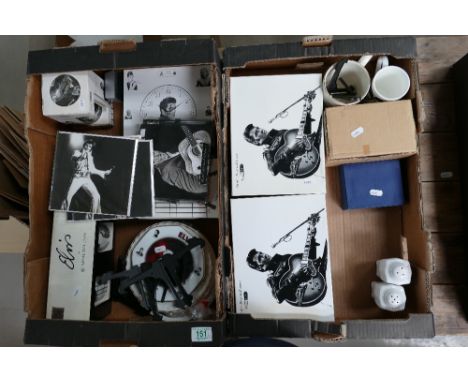 A collection of boxed Elvis inspired items to include - mug and coaster sets, alarm clocks, Royal Doulton mug set, porcelain 