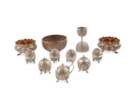 to include a double ended jigger, a pair of bon bon dishes with gilt interior, a sugar basin and a collection of condiments, 