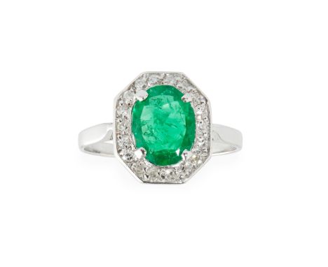 claw set with an oval-cut emerald, in a single border of eight-cut diamonds, to a plain unmarked shank; with accompanying rep