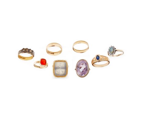 to include an 18ct gold wedding band, and another unmarked; a 9ct gold amethyst set cocktail ring and 18ct gold agate set sig