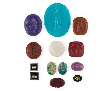 to include; an oval purple glass matrix with head of Pericles wearing a helmet, titled in Greek; a large green glass example,