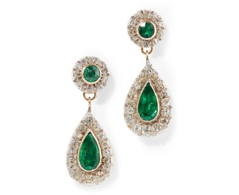 each set with a round-cut emerald, in a border of cushion-cut diamonds, suspending a detachable pear shaped drop collet set w