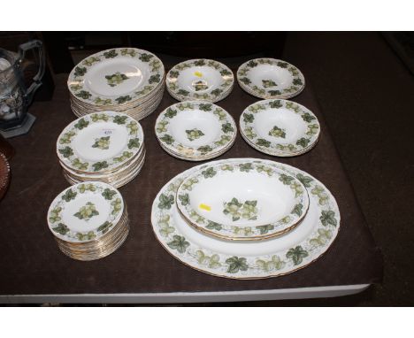 A quantity of Royal Worcester, 'the Worcester Hop' patterned dinnerware