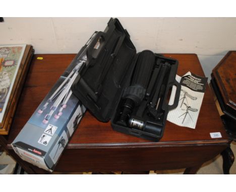 A Hama tripod with original box together with a Tasco spotting scope and fitted carry case