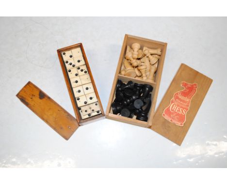 A Staunton boxwood chess set and a box of dominoes