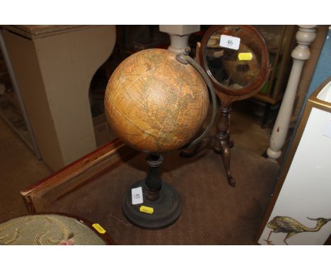 A Geographia 6" terrestrial globe approx. 33cm in height