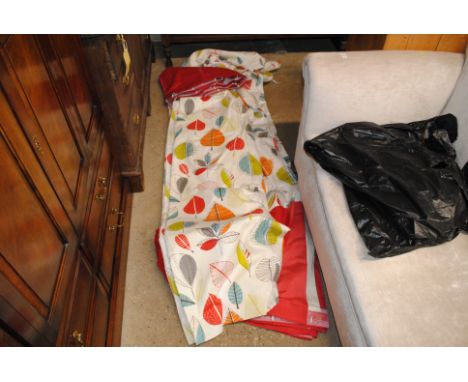 A large quantity of material to include leaf patterned curtains
