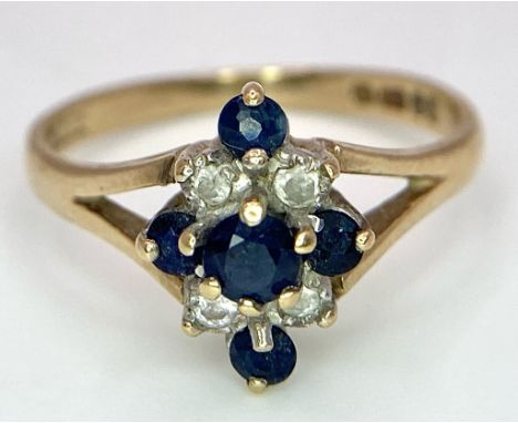 A Vintage 9K Yellow Gold Diamond and Sapphire Ring. Size K. 2g total weight. 
