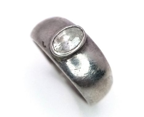 A vintage 925 silver Zirconia ring. Total weight 4.3G. Size P. 