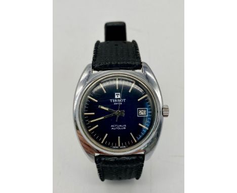 A Vintage Tissot Actualis Autolub Mechanical Gents Watch. Textured synthetic strap. Stainless steel case - 37mm. Midnight blu