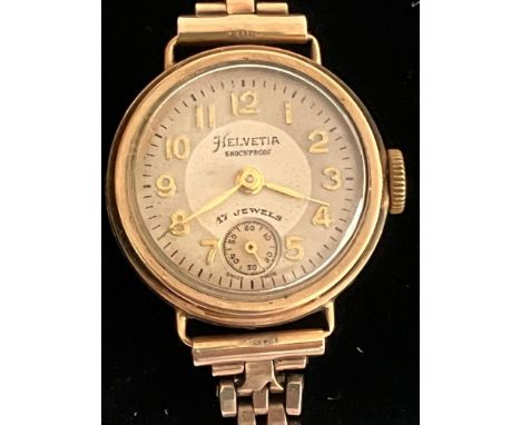 Ladies vintage 9 carat GOLD HELVETIA WRISTWATCH with 9 carat GOLD BRACELET STRAP. 17 Jewels Swiss Made. Manual winding in  fu