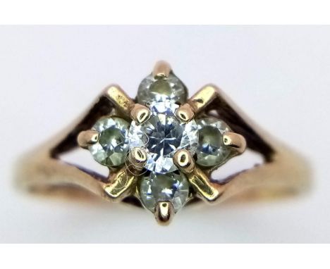 A Vintage 9k Yellow Gold Diamond Cluster Ring. Five diamonds in a raised setting. Size J. 1.56g total weight. 