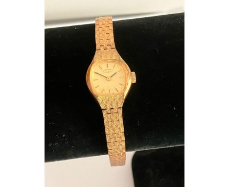 Ladies Vintage ROTARY WRISTWATCH. Finished in gold tone with integral bracelet strap. Complete with original case and paperwo