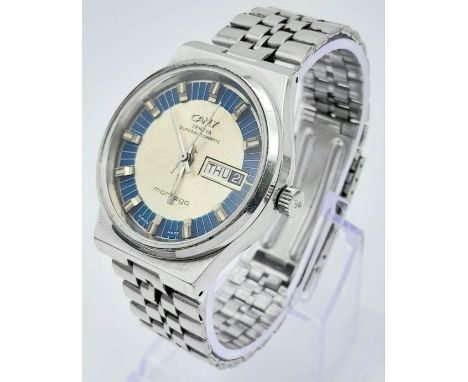 A Vintage Camy Montego Automatic Gents Watch. Stainless steel bracelet and case - 36mm. Two tone dial with day/date window. I