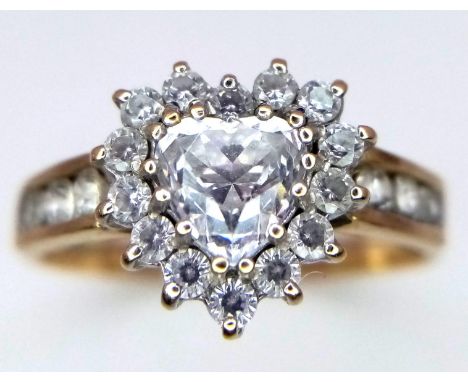 A 14K Yellow Gold and White Zircon Heart Ring. Size R. 3.3g weight.