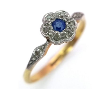 A VINTAGE 18K GOLD SAPPHIRE AND DIAMOND RING WITH PLATINUM SETTING .   1.9gms   size O 